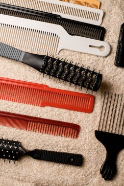 top view on set of tools, comb, hairbrushes for hairdressing service. Hairdresser accessories. Barbershop. Close-up