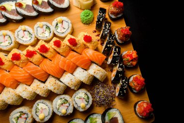 Indulge in a showcase of the finest sushi, a testament to the skill and passion of our sushi artisans. clipart