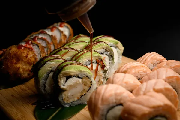 Close View Showcasing Three Sushi Sets Wood Highlighting Moment Seasoning Лицензионные Стоковые Изображения