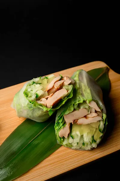 Two Tempting Spring Rolls One Cucumber Other Ham Served Banana Stock Picture