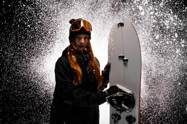 Cropped Photo Young Sexy Woman Her Snowboard Snowfall Dark Background Royalty Free Stock Images