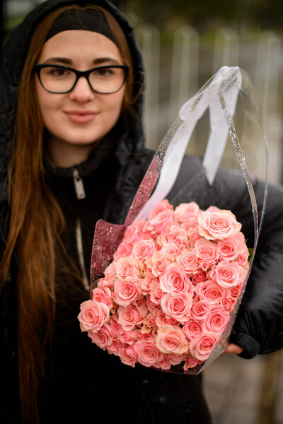 Focus Huge Bouquet Pink Roses Transparent Gift Bag Hands Pretty Stock Picture