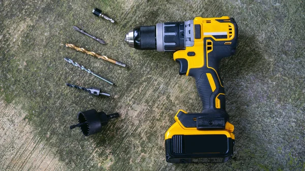 Power drill or Cordless screwdriver with battery.