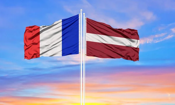 France Latvia Two Flags Flagpoles Blue Cloudy Sky Diplomacy Concept — Stock Photo, Image