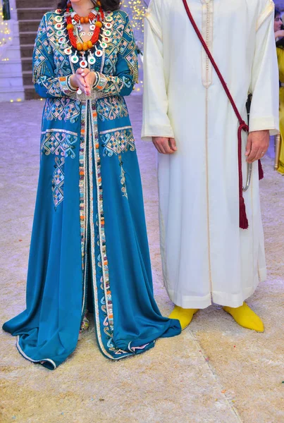 Moroccan bride and groom . They wear traditional Moroccan clothes on their wedding night