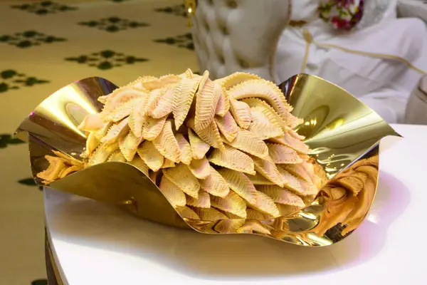 stock image Homemade sweets from gazelle horns for Ramadan. Close-up detail shot of fresh baked Kaab El Ghazal, a moroccan sweet also known as gazelle horns, Halal foo