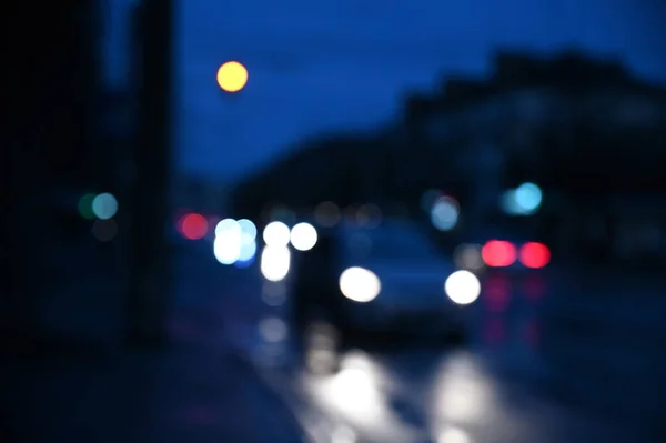city night traffic with car lights, defocused background
