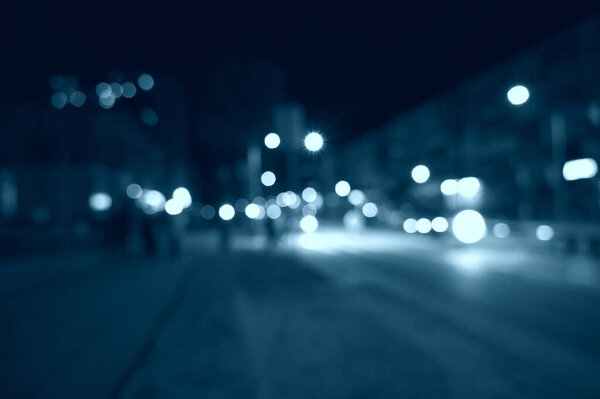 Evening city lights blur background
