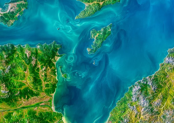 Aerial view of Sea of Okhotsk with natural swirl pattern. Abstract tide shapes on the sea in Russia, nature landscape background or wallpaper. Elements of this image furnished by NASA