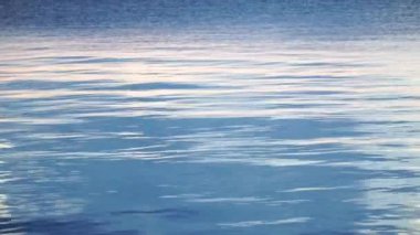 Sea surface. Calm tranquil sea footage. Reflections on the sea surface