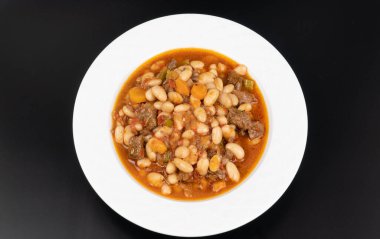 Kuru Fasulye. Traditional Turkish cuisine. Turkish dish. Haricot beans with meat. Top view.