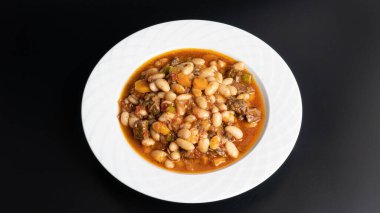 Kuru Fasulye. Traditional Turkish cuisine. Turkish dish. Haricot beans with meat. Top view.