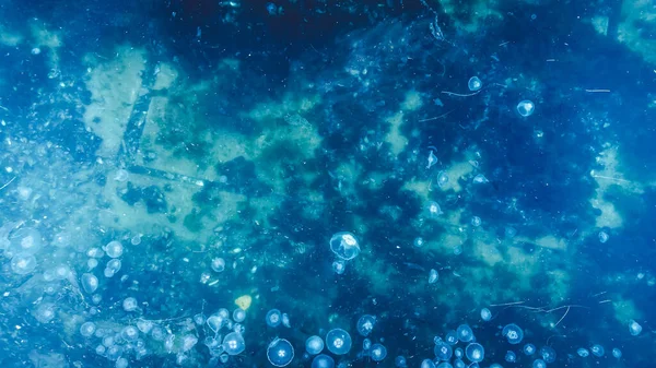 Aerial view of mucilage on the sea. Dirty sea with toxic poisonous waste. Sea snot. Selective focus. Noise and grain included