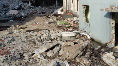 Destroyed city because of war. Buildings damaged by an enemy aircraft missiles. Ruined city. Attack on civilian settlements. War crime.