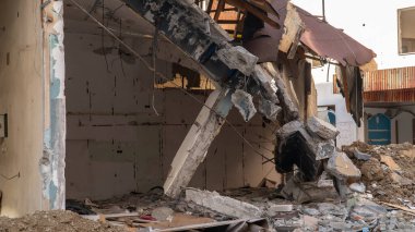 Earthquake damage in a city. Destroyed buildings after an earthquake. Selective focus included.