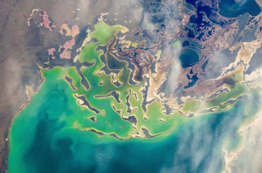 Lake Tengiz in Kazakhstan. Aerial view of lake. Earth landscape satellite view. Natural patterns of Earth. Selective focus included. Noise and grain included. Elements of this image furnished by NASA