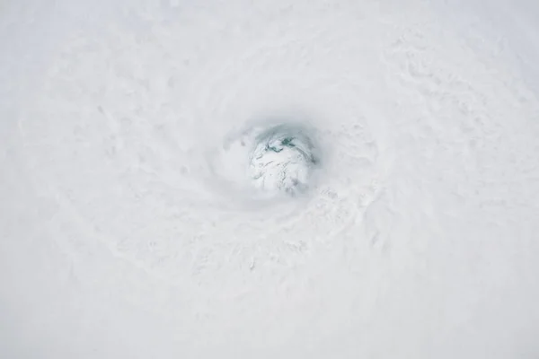 Hurricane from space, satellite view. Hurricane catastrophe. Elements of this image furnished by NASA. Selective focus. Noise and grain included