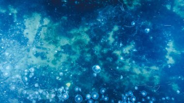 Aerial view of mucilage on the sea. Dirty sea with toxic poisonous waste. Sea snot. Selective focus. Noise and grain included