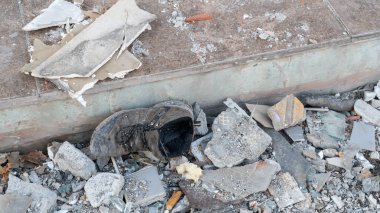 Urban transformation, the process of redevelopment and revitalization of urban areas. Excavators in construction site demolishing old buildings in. Selective focus included