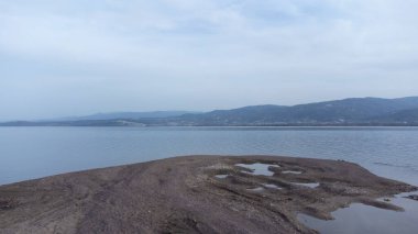 Lake Sapanca in Sakarya Turkey. Lake water level decreased due to drought. Aerial view of lake. Drone view Selective focus included. Noise and grain included.