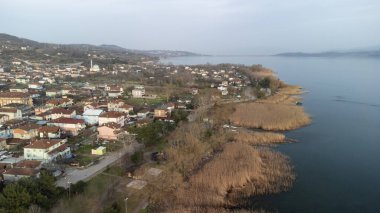 Lake Sapanca in Sakarya Turkey. Lake water level decreased due to drought. Aerial view of lake. Drone view Selective focus included. Noise and grain included.