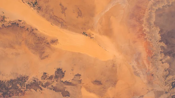 Sahara Desert in Algeria aerial view. Earth landscape. Selective focus included. Elements of this image furnished by NASA