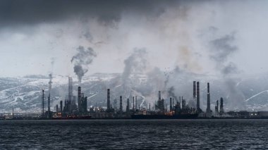 Environmental pollution. Toxic chemical gases releasing to atmosphere from oil refinery plant. Selective focus included. Noise and grain included