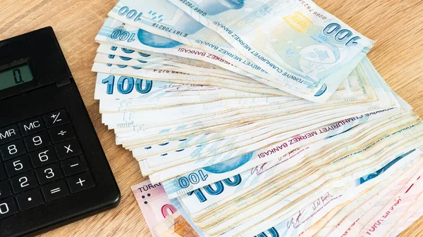 stock image Turkish lira banknotes and calculator. Accounting concept.