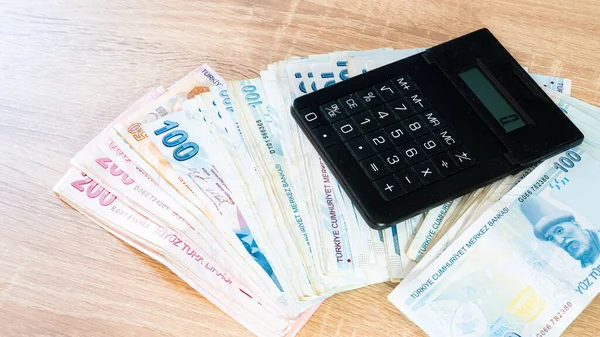 stock image Turkish lira banknotes and calculator. Accounting concept.