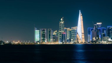Katar 'da gece vakti Doha Skyline. Doha Şehir Manzarası. İş konsepti