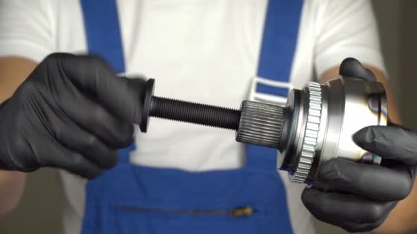 Auto Mechanic Blue Jumpsuit Holds His Hands Hinge Equal Angular — Stock Video