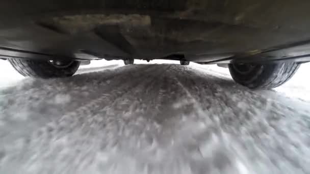 View Bottom Car Suspension Wheels Car Accelerates Winter Highway Bottom — Stockvideo
