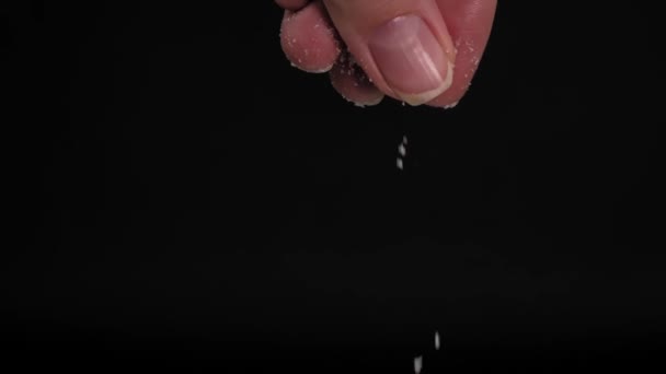Slow Motion Video Large Female Hand Sprinkling Adding Salt Black — Stock videók