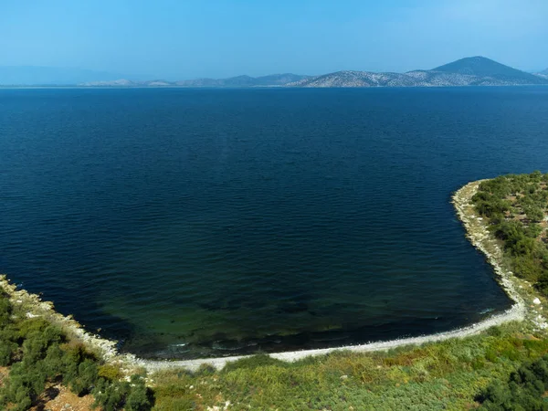 Picturesque landscape from a drone on Lake Bafa in Turkey. Beautiful lake landscape from a drone on a sunny day