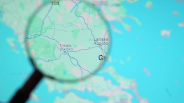 Batumi Georgia 2024年1月11日 希腊通过谷歌地球屏幕上的放大镜 电脑屏幕上的数字地图上的放大玻璃 — 图库视频影像