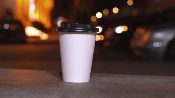 Two White Paper Disposable Cups Blurred Background Evening City Lights — Stock Video