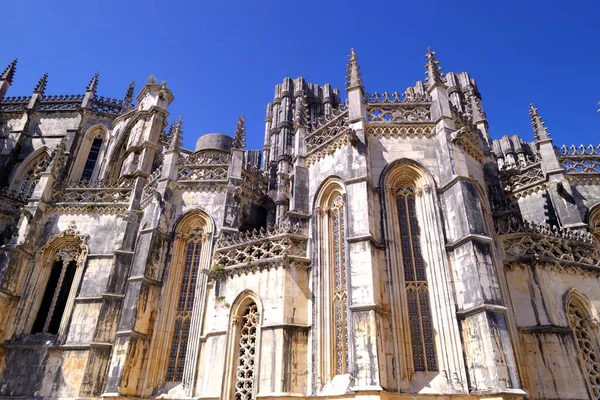 stock image Batalha, Portugal - August 15, 2022: Detail of exterior of Monastery showing gothic and intricate design features