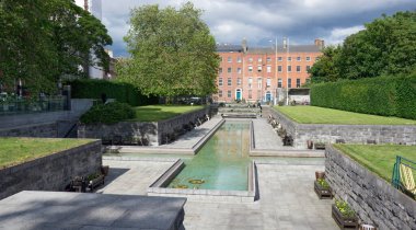 Dublin, Ireland - June 14, 2024: View of Garden of Remembrance commemorating those who lost their lives fighting for Irish independence showing water feature in shape of cross clipart