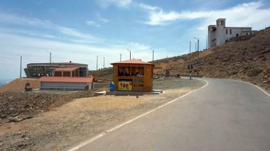 Chimbote, Peru - January 4, 2023: C Church of cerro de la Paz (Hill of Peace) with restaurant, kiosk and access road in foreground clipart