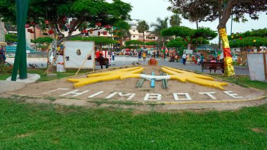 Chimbote, Peru - January 4, 2023: Main square in Chimbote Peru, Plaza de Armas, with city emblem and name as white block capital letters constructed as ground feature clipart