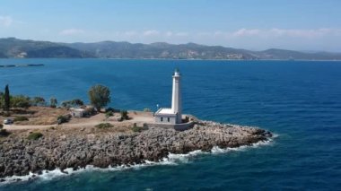 Aerial view over the lighthouse on Nisis Kranai or Kranai Islet in Gytheio, Laconia, Greece