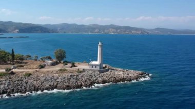 Aerial view over the lighthouse on Nisis Kranai or Kranai Islet in Gytheio, Laconia, Greece