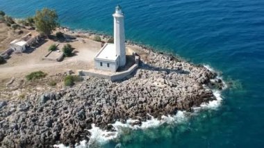 Aerial view over the lighthouse on Nisis Kranai or Kranai Islet in Gytheio, Laconia, Greece