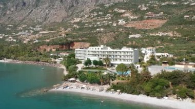 Aerial view over Almyros beach with luxurious hotels and resorts in Kato verga kalamata, Greece