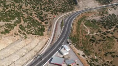 Aerial panoramic view over Moreas Motorway at Artemisio mount. A7 begins just west of the Isthmus of Corinth, branching off from Greek National Road 8A connecting Corinth and Kalamata via Tripoli
