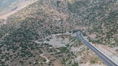 Aerial panoramic view over Moreas Motorway at Artemisio mount. A7 begins just west of the Isthmus of Corinth, branching off from Greek National Road 8A connecting Corinth and Kalamata via Tripoli