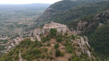 Aerial panoramic view of iconic Byzantine and medieval fortified despotate of Mystras on Mount Taygetus locaten near Sparti town, Laconia, Peloponnese, Greece