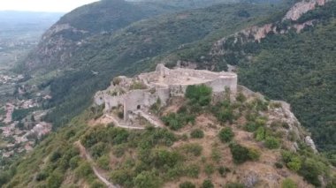 Aerial panoramic view of iconic Byzantine and medieval fortified despotate of Mystras on Mount Taygetus locaten near Sparti town, Laconia, Peloponnese, Greece