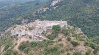 Aerial panoramic view of iconic Byzantine and medieval fortified despotate of Mystras on Mount Taygetus locaten near Sparti town, Laconia, Peloponnese, Greece