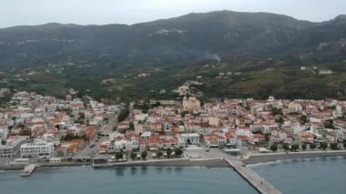 Aerial cityscape view of Neapolis town at sunset. Also named Vatika in Laconia, Greece. Neapoli is a famous coastal town built on the same site as the ancient Laconian city of Boeae
